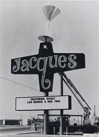 (NEON SIGNAGE) A group of approximately 105 photographs of eccentric neon signs promoting drive-in theaters, bowling alleys, cocktail l